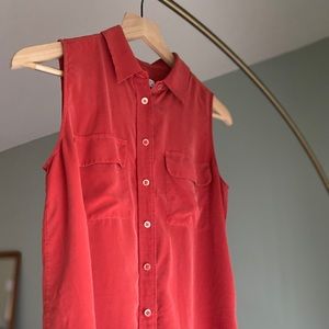 Pink sleeveless blouse